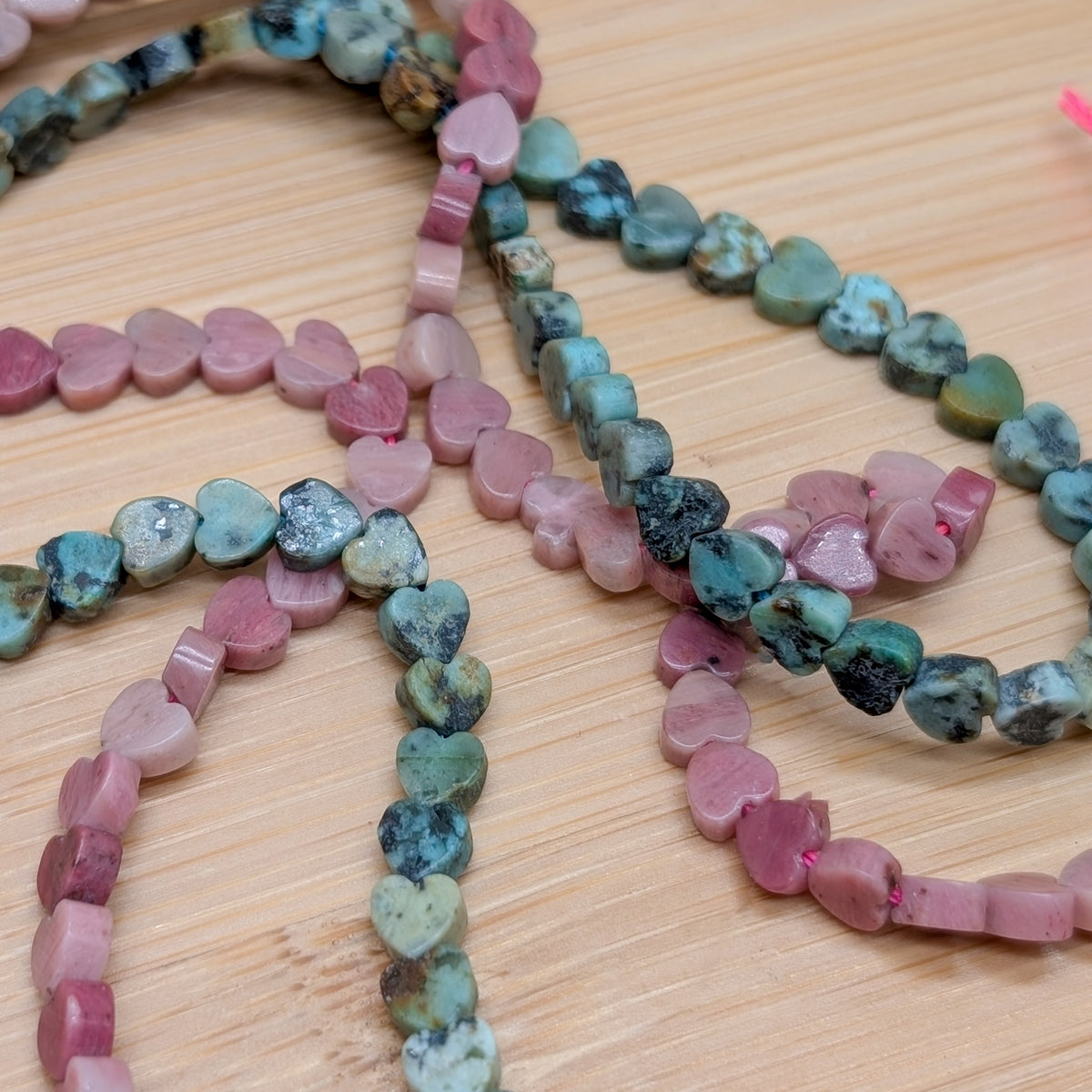 Mini Herz Perle Türkis / Rhodonit