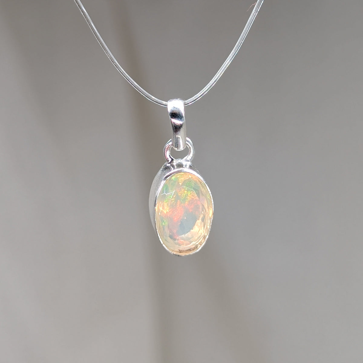 Opal Kettenanhänger facettiert, 925er Silber [K]